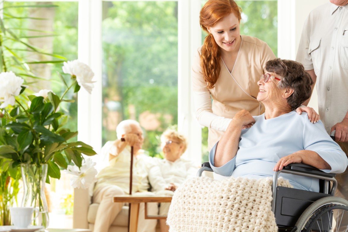 elderly woman in wheelchair