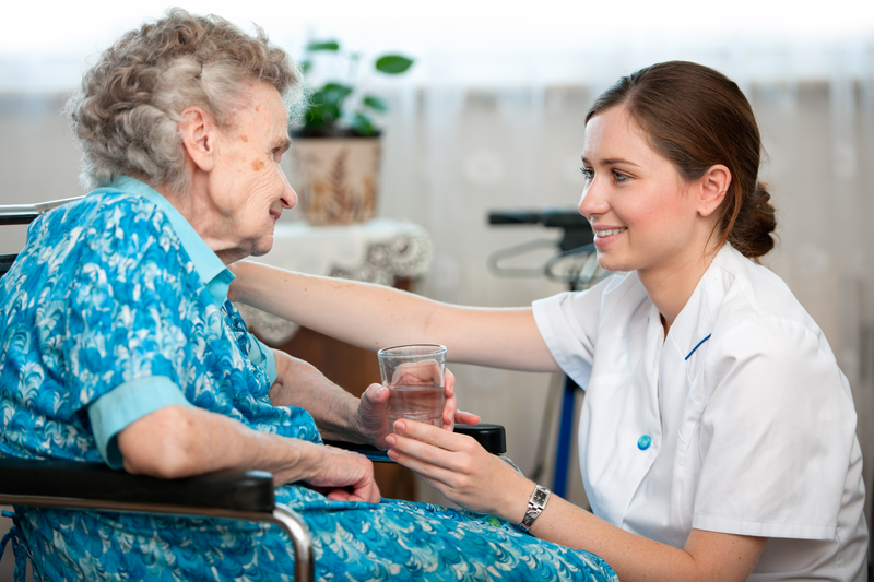 giving a glass of water